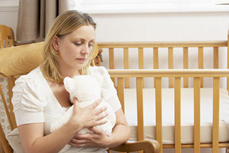 Sad woman, after miscarriage, hypnotherapy can help