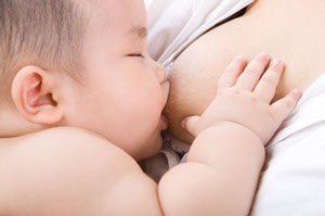 Photo of a woman breast feeding her baby